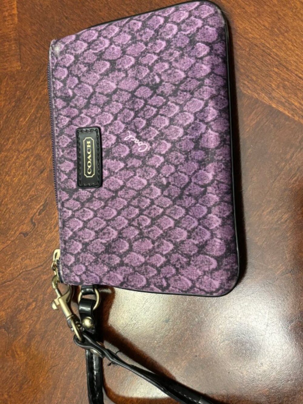 Coach wristlet- purple snake